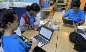 Middle school students researching